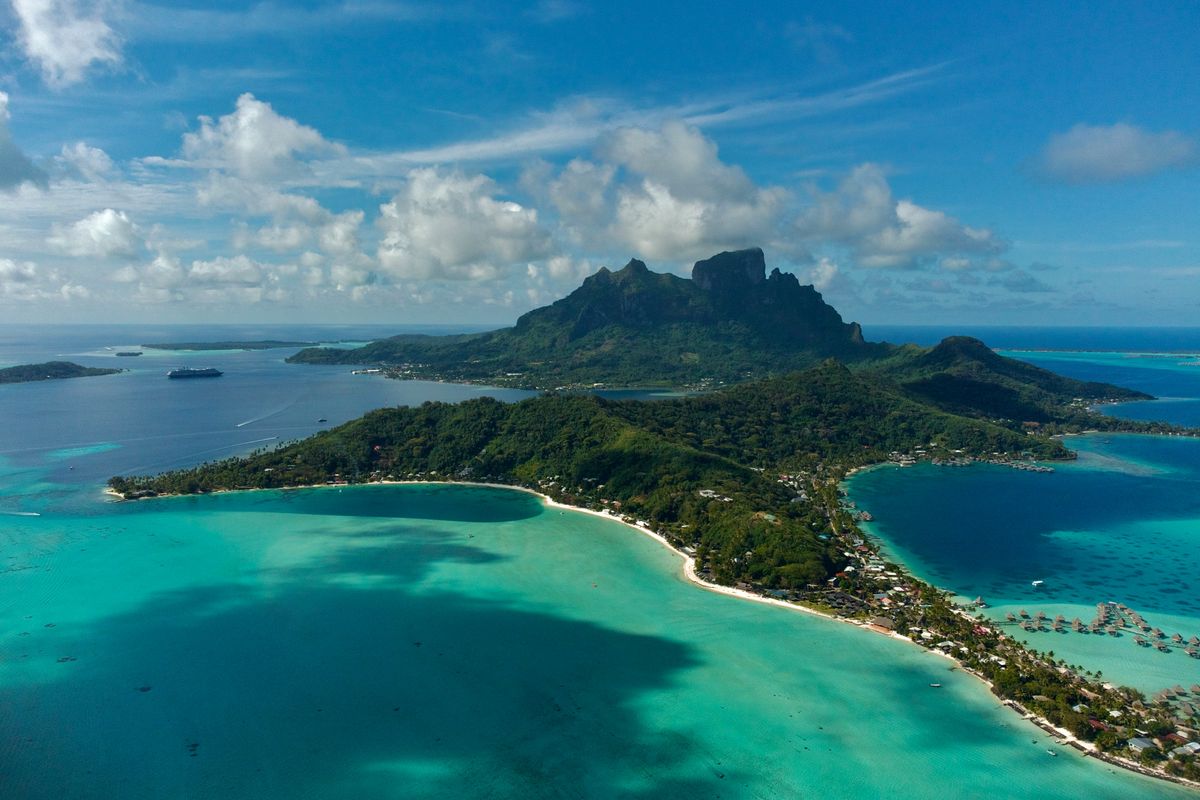 Bora Bora's lagoon wrapping around Mount Otemanu from above