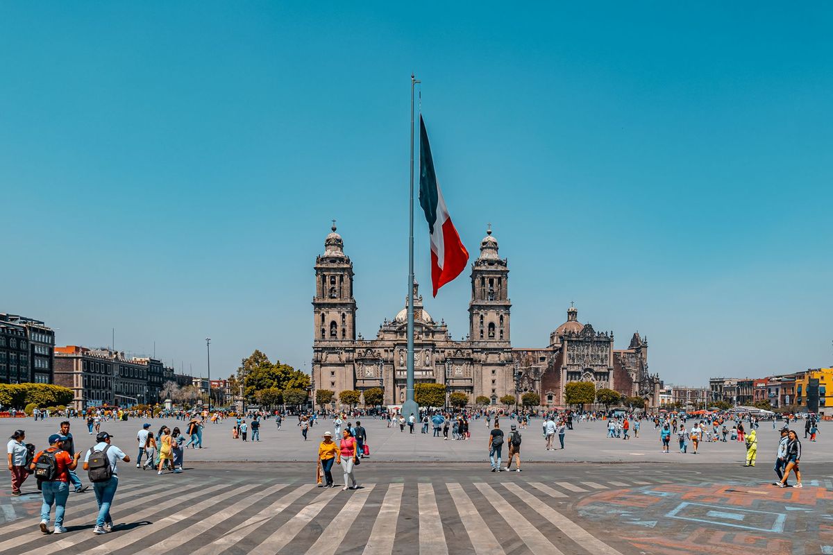 The Zócalo in Mexico City, with the Metropolitan Cathedral behind the national flag